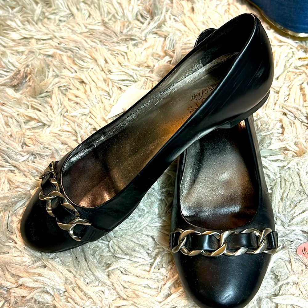 Black leather flats